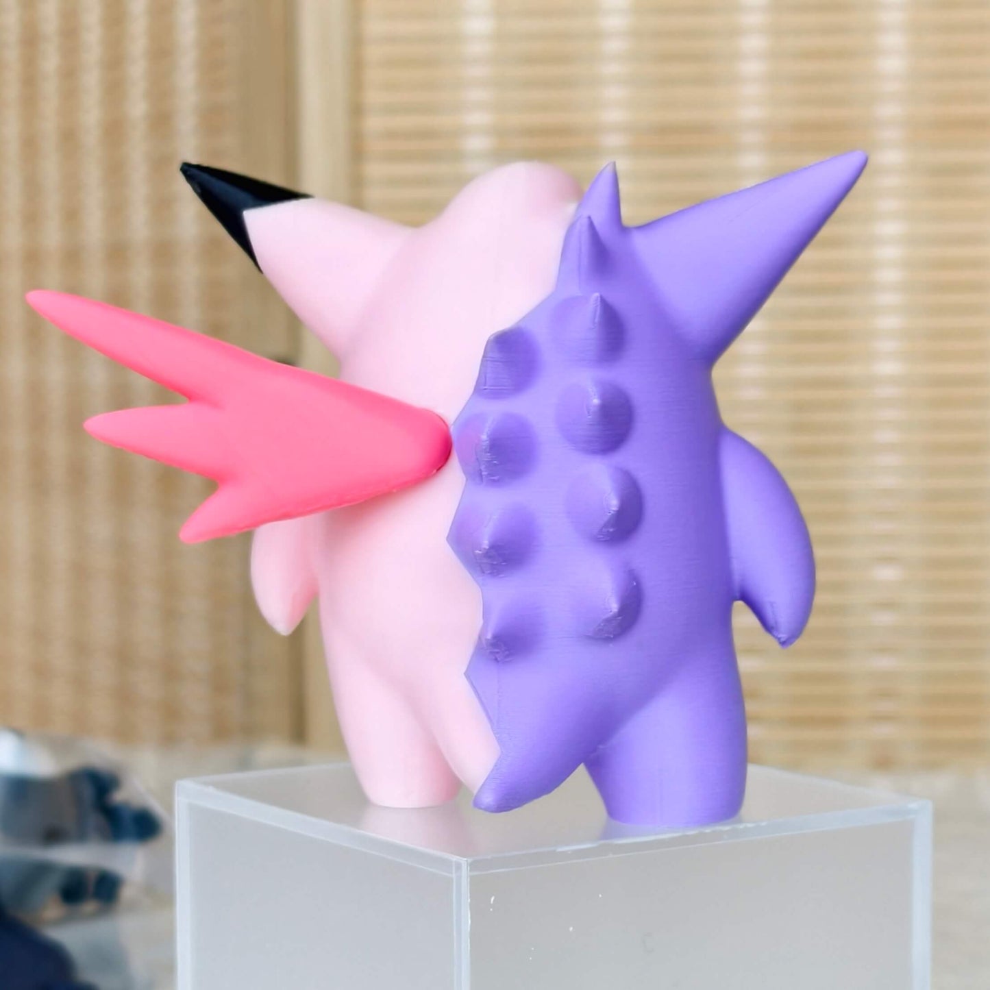Backside of Gengar and Clefable half fusion figurine showing magnetic split design and detailed sculpt