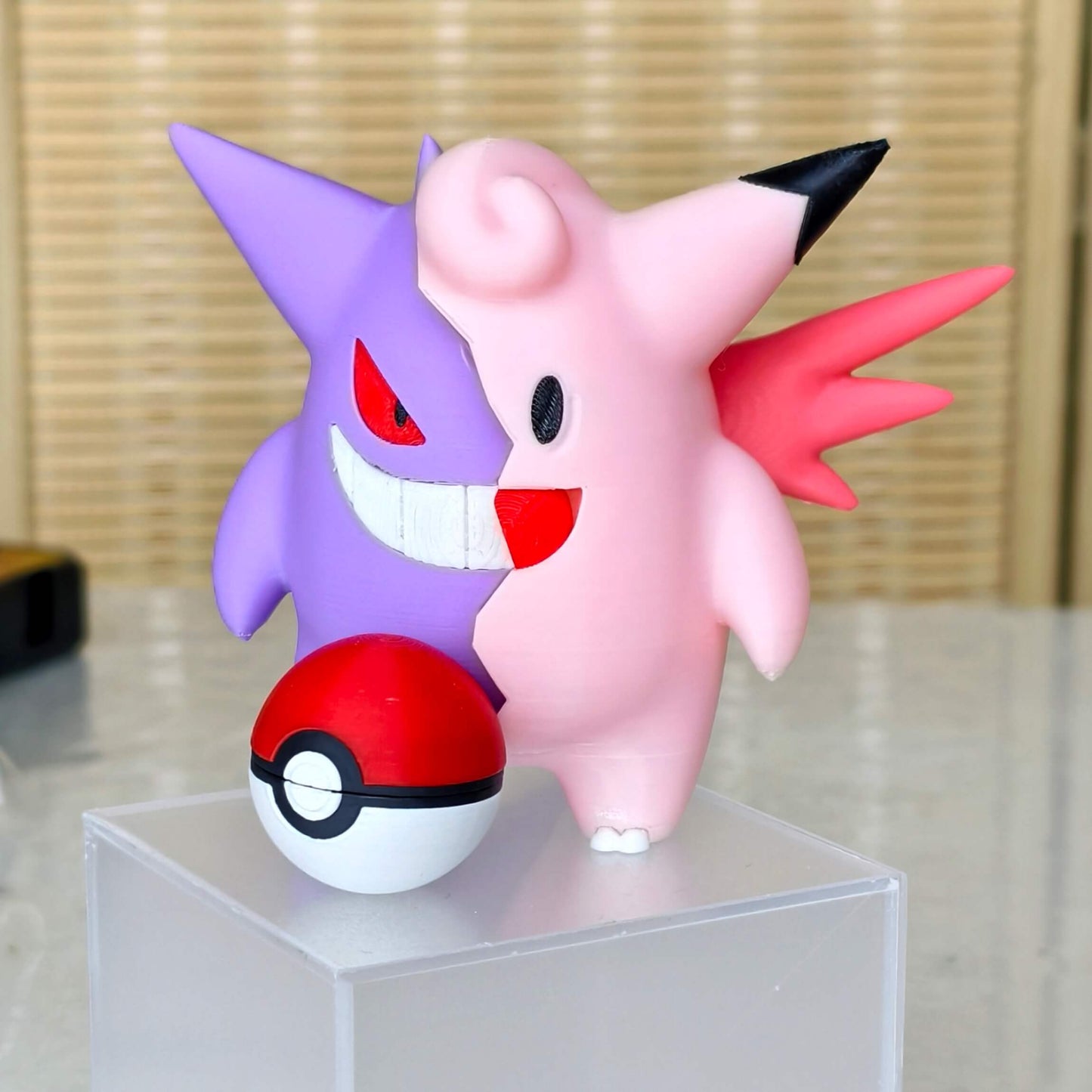 Front view of Gengar and Clefable fusion figure with Poké Ball, magnetic half design, handmade collectible toy