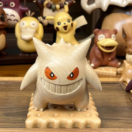Front view of a handcrafted Shiny Gengar wooden figure on a display base
